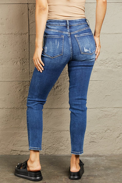 Mid Rise Distressed Slim Jeans